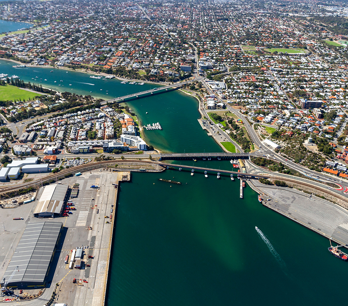 Aerial view of a city with waterways, capturing Lofte's marine logistics activity